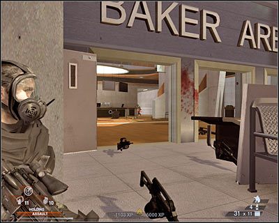 Twoje nowe zadanie polega na wysadzeniu pokazanego na screenie przejścia - Hala sportowa (cz.3) | Akt 3 - Centrum rekreacyjne | Rainbow Six Vegas 2 - Tom Clancys Rainbow Six Vegas 2 - poradnik do gry