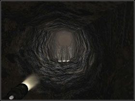 Na dole tunelu skręć w lewo - będziesz ścigany przez pająki i zawalający się tunel, więc nie możesz zwolnić ani na chwilę - Opis przejścia (cz.2) | Rozdział II | Penumbra Przebudzenie - Penumbra: Przebudzenie - poradnik do gry