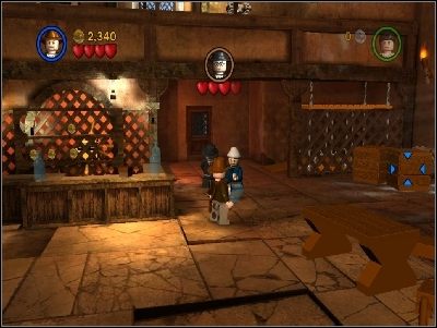 Gdy to zrobisz, zza baru zacznie ostrzeliwać Cię mężczyzna - Chapter 2 - Into the Mountains (cz.1) - Poszukiwacze Zaginionej Arki - LEGO Indiana Jones: The Original Adventures - poradnik do gry