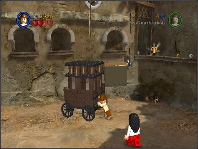 Idź w prawo, pokonaj przeciwników i przepchnij w lewo duży wagon - Chapter 3 - City of Danger (cz.1) - Poszukiwacze Zaginionej Arki - LEGO Indiana Jones: The Original Adventures - poradnik do gry