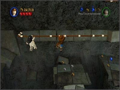 Idź w prawo, używając belek, a następnie przeskocz dalej za pomocą liany - Chapter 4 - The Well of Souls (cz.3) - Poszukiwacze Zaginionej Arki - LEGO Indiana Jones: The Original Adventures - poradnik do gry