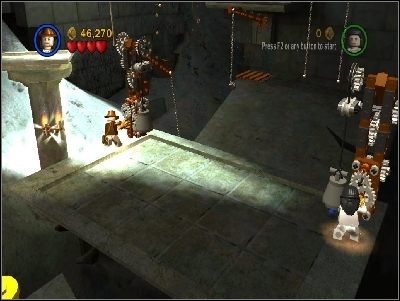 Jako Marion przeskocz na lianę i wskocz na podest - Chapter 4 - The Well of Souls (cz.3) - Poszukiwacze Zaginionej Arki - LEGO Indiana Jones: The Original Adventures - poradnik do gry