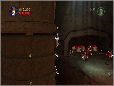 Gdy uda Ci się przejść na prawą stronę, pokonaj strażników i użyj równocześnie dwu dźwigni - Chapter 3 - The Temple of Kali (cz.2) - Świątynia Zagłady - LEGO Indiana Jones: The Original Adventures - poradnik do gry