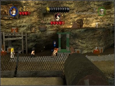 Zmień postać i przepchnij wózek torami na prawą stronę - Chapter 4 - Free the Slaves (cz.3) - Świątynia Zagłady - LEGO Indiana Jones: The Original Adventures - poradnik do gry