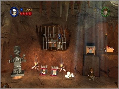 Jako dzieciak użyj małego przejścia, a następnie przestaw dźwignię, co podniesie wyjście - Chapter 3 - The Temple of Kali (cz.1) - Świątynia Zagłady - LEGO Indiana Jones: The Original Adventures - poradnik do gry