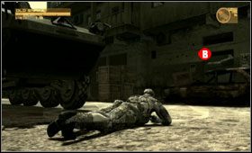 Poczekaj, aż droga zrobi się wolna i przeczołgaj się w pobliże transportera [A] - Middle East - Ground Zero | Akt pierwszy Metal Gear Solid 4 Guns of the Patriots - Metal Gear Solid 4: Guns of the Patriots - poradnik do gry