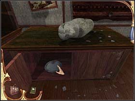 Tu otwiera (oczywiście, posłużywszy się jak dotychczas nożem ceremonialnym) szafki pierwszą i trzecią od lewej - [Opis przejścia] Część piąta (3) | Sherlock Holmes Tajemnica Mumii - Sherlock Holmes: Tajemnica Mumii - poradnik do gry