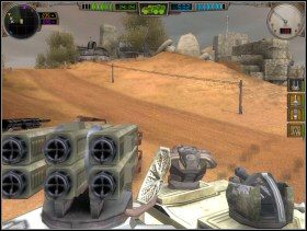 Po przejechaniu mostu trafiłem na osadę, która uważała mnie za wroga - strażnicy ostro naparzali do mnie z działek, więc czym prędzej się oddaliłem - Wolne miasta i bandyci (1) | Przygoda | Hard Truck Apocalypse - Hard Truck: Apocalypse - poradnik do gry