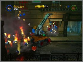 Kontynuuj jazdę w prawo przez kolejną bramę - The Riddler Makes a Withdrawal (cz.2) | Villiant Episode 4 - LEGO Batman: The Videogame - poradnik do gry