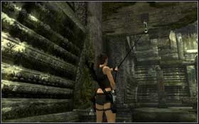 Przejdź pod kamienną poręczą znajdującą się na prawo od filarów i złap chwytakiem metalowe kółko - Coastal Thailand - Bhogavathi (cz.1) | Solucja Tomb Raider Underworld - Tomb Raider: Underworld - poradnik do gry