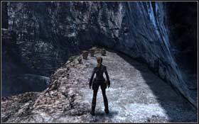 [120] Na skalnej półce po prawej stronie, za wrotami otwieranymi mocą rękawic Thora - Jan Mayen Island - Gate of the Dead | Sekrety Tomb Raider Underworld - Tomb Raider: Underworld - poradnik do gry