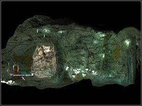 Następnie zabiera się za zbadanie głazu po lewej, najprawdopodobniej zasłaniającego wyjście z pieczary (zbliżenie) - Znaleźć wyjście z jaskini | Jaskinia | Zaginiona historia Tale of Hero - Zaginiona historia: Tale of Hero - poradnik do gry