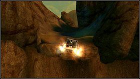 Skręć w lewo i skieruj się drogą koło płonącego wraku - jest tu kilku przeciwników - Opis przejścia - część druga - 01 | Advent Rising - Advent Rising - poradnik do gry