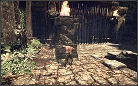 Kopnij płonącą statuę, zeskocz na dziedziniec i przepchnij ją pod jeden z koszów zawieszonych po bokach bramy prowadzącej do dalszej części kompleksu - Betrayal | Rozdział 3 Days of Future Beginnings | X-Men Origins Wolverine - X-Men Origins: Wolverine - poradnik do gry