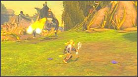 Po walce wejdź na platformę, skręć w prawo a następnie wejdź do małej jaskini, aby stoczyć walkę z drugim dinozaurem - Outpost L51, Planet Sargasso | Opis przejścia - Ratchet & Clank: Tools of Destruction - poradnik do gry