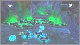 Na końcu ścieżki zbierz grupkę Zoni, wróć do miejsca, z którego skakałeś a następnie zasil urządzenie dzięki robotom - Cragmite Ruins, Planet Reepor | Opis przejścia - Ratchet & Clank: Tools of Destruction - poradnik do gry