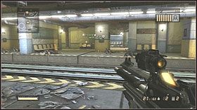 Podejdź do niebieskiego filara i naciśnij przycisk, który jest naprzeciw - Chicago, Illinois | Opis przejścia Coop | Resistance 2 - Resistance 2 - poradnik do gry