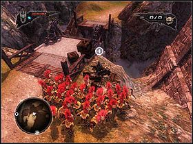 Niedaleko znajduje się blokada, a obok niej dziura, z której mogą skorzystać Miniony - Empire Harbor | Zadania główne w Overlord II - Overlord II - poradnik do gry