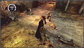 Na lewo od Ciebie stoi pierwszy przeciwnik, którego możesz się pozbyć wykonując atak z ukrycia - Caves | Opis przejścia Batman Arkham Asylum - Batman: Arkham Asylum - poradniki