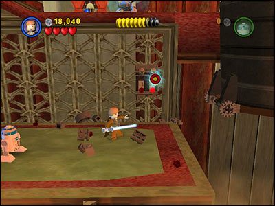 Idź na prawo aż do końca pomieszczenia i otwórz drzwi przy pomocy R2 - Chapter 3 - Droid Factory - Story Mode - Episode 2 - LEGO Star Wars: The Complete Saga - poradnik do gry