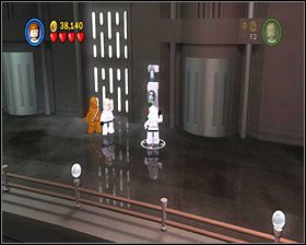 Uporaj się z dużą grupą szturmowców w pomieszczeniu z komputerami i użyj panelu przy drzwiach - znów potrzebujesz hełmu - Chapter 4 - Rescue The Princess - Story Mode - Episode 4 - LEGO Star Wars: The Complete Saga - poradnik do gry