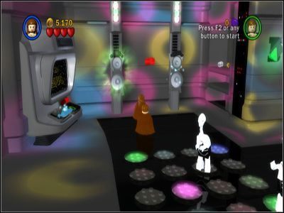 Gdy zniszczysz dwie wieżyczki chroniące Fetta, skorzystaj z drzwi po lewej - Chapter 2 - Discovery on Kamino - Free Play - Episode 2 - LEGO Star Wars: The Complete Saga - poradnik do gry