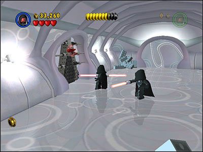 W korytarzu, w którym zamykałeś tunele, przez które wlatywały roboty, użyj Sitha do otwarcia czarnych drzwi po lewej - Chapter 2 - Discovery on Kamino - Free Play - Episode 2 - LEGO Star Wars: The Complete Saga - poradnik do gry