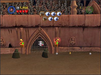 Użyj Mocy na przełącznikach widocznych na screenie, na prawo od miejsca uwięzienia Padme - Chapter 4 - Jedi Battle - Free Play - Episode 2 - LEGO Star Wars: The Complete Saga - poradnik do gry