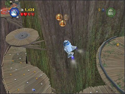 Użyj R2, by przelecieć z platformy, na której uwolniłeś pierwszego Wookiego w lewo, a następnie doskocz Jar-Jarem do kanistra - Chapter 4 - Defense of Kashyyyk - Free Play - Episode 3 - LEGO Star Wars: The Complete Saga - poradnik do gry