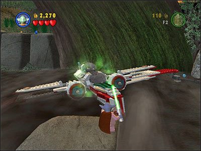 Użyj Mocy na zatopionym w bagnie myśliwcu, po czym szybko przełącz się na Jar-Jara i wskocz na kabinę pilota - Chapter 4 - Defense of Kashyyyk - Free Play - Episode 3 - LEGO Star Wars: The Complete Saga - poradnik do gry