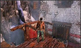 W okolicy dostrzeżesz kamienny słup z drewniana krokwią, przymocowaną do jego górnej części - Rozdział 22 Gompa (2) | Opis przejścia Uncharted 2 Among Thieves - Uncharted 2: Among Thieves - poradnik do gry