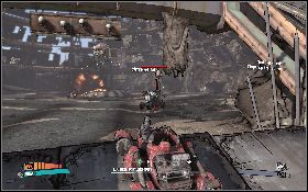 Kiedy rozprawisz się z kilkoma wrogami, z środka ognistego kręgu w centrum areny wyjedzie Mad Mel (lewy obrazek) - Road Warriors | Dahl Headlands | Solucja Borderlands - Borderlands - poradnik do gry