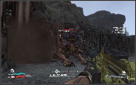 Kiedy znajdziesz się na arenie, podejdź do pala (lewy obrazek) stojącego z lewej strony jaskini i nabij na niego przynętę - Big Game Hunter | Dahl Headlands | Solucja Borderlands - Borderlands - poradnik do gry