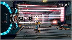 Zanim przejedziemy się windą trzeba usunąć robota (pełniącego rolę odźwiernego - Vorselons Ship | Opis przejścia | Ratchet & Clank A Crack in Time - Ratchet & Clank: A Crack in Time - poradnik do gry