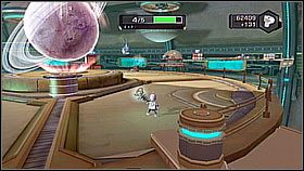 Dalej przeskakujemy przez kilka wirujących okręgów używając bomby czasowej - The Great Clock III | Opis przejścia | Ratchet & Clank A Crack in Time - Ratchet & Clank: A Crack in Time - poradnik do gry