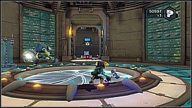 Znajduje się na końcu budynku, do którego trzeba było wskoczyć podczas misji - Vela Sector - Terachnos, Axiom City | Sekrety | Ratchet & Clank A Crack in Time - Ratchet & Clank: A Crack in Time - poradnik do gry