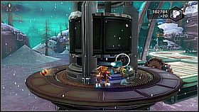 Ulepszenie ukryte w rafinerii za jednym z mechanizmów, który przełączaliśmy - Korthos Sector - Tombli Outpost | Sekrety | Ratchet & Clank A Crack in Time - Ratchet & Clank: A Crack in Time - poradnik do gry