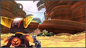 Po rozpoczęciu obracamy się i wchodzimy do kanionu (otwarta przestrzeń) - Korthos Sector - Lumos, Krall Canyon | Sekrety | Ratchet & Clank A Crack in Time - Ratchet & Clank: A Crack in Time - poradnik do gry