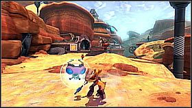 Po kilku wyskokach i rampach trzeba uważać - na ostatniej z nich musimy wyskoczyć na skocznie a potem przyspieszyć (gra nie zawsze łapie postać) - Korthos Sector - Lumos, Krall Canyon | Sekrety | Ratchet & Clank A Crack in Time - Ratchet & Clank: A Crack in Time - poradnik do gry