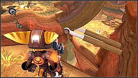 Zaczynając od statku wychodzimy w stronę kanionu i skręcamy w prawo - Zoni znajduje się na półce skalnej poniżej - Korthos Sector - Lumos, Krall Canyon | Sekrety | Ratchet & Clank A Crack in Time - Ratchet & Clank: A Crack in Time - poradnik do gry