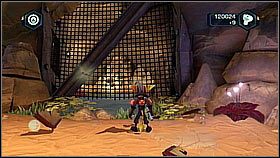 Druga złota śrubka znajduje się w jaskiniach koło statku - jest za kratą - Korthos Sector - Lumos, Krall Canyon | Sekrety | Ratchet & Clank A Crack in Time - Ratchet & Clank: A Crack in Time - poradnik do gry