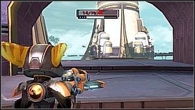 Jest po drugiej arenie treningowej, tam gdzie znajduje się jeden z Zoni - Bernilius Sector - Valkyrie Citadel | Sekrety | Ratchet & Clank A Crack in Time - Ratchet & Clank: A Crack in Time - poradnik do gry