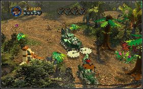 Następnie opuść pojazd i zacznij biec po dróżce w prawo [1] - Draka w lesie deszczowym | Kryształowa Czaszka Akt II | LEGO Indiana Jones 2 - LEGO Indiana Jones 2: The Adventure Continues - poradnik do gry