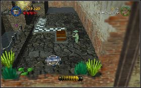 Biczem Indiany złap chwytak znajdujący się za bramą, a potem wskocz na obniżoną platformę z prawej [1] - Lotnisko w Peru (bonus) | Kryształowa Czaszka Akt II | LEGO Indiana Jones 2 - LEGO Indiana Jones 2: The Adventure Continues - poradnik do gry