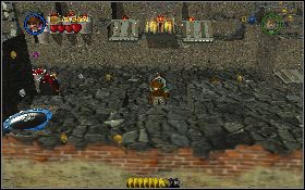 Następnie przy pomocy bicza rusz dwa pomarańczowy chwytaki, które aktywują piły mechaniczne - Peruwiański targ (bonus) | Kryształowa Czaszka Akt II | LEGO Indiana Jones 2 - LEGO Indiana Jones 2: The Adventure Continues - poradnik do gry