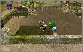 Na ścianie pod wejściem do jaskini Cmentarnego wojownika znajduje się kamienna płyta [1] - Cmentarny grobowiec (bonus) | Kryształowa Czaszka Akt II | LEGO Indiana Jones 2 - LEGO Indiana Jones 2: The Adventure Continues - poradnik do gry