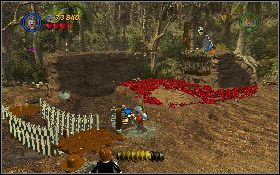 Podnieś zrzuconego z palmy banana i rzuć go w stronę małpy [1] siedzącej nad jaskinią - Straszne naprawy | Kryształowa Czaszka Akt III | LEGO Indiana Jones 2 - LEGO Indiana Jones 2: The Adventure Continues - poradnik do gry