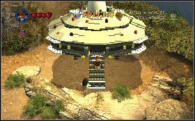 Po zabraniu dziesięciu skrzyń udaj się do dużego statku kosmicznego, zniszcz wszystkie otaczające go skarby [1] , a z części, które z nich wylecą, napraw pojazd obcych - Superpremia | Kryształowa Czaszka Akt III | LEGO Indiana Jones 2 - LEGO Indiana Jones 2: The Adventure Continues - poradnik do gry