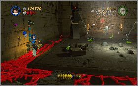 Następnie, z tego samego pomieszczenia, podnieś Marion pochodnię, wejdź między czerwone węże i aktywuj mechanizm z prawej [1] i lewej [2] strony sali - Tajemnica pokoju map | Poszukiwacze Zaginionej Arki | LEGO Indiana Jones 2 - LEGO Indiana Jones 2: The Adventure Continues - poradnik do gry