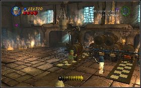 Przejdź w prawo i strzel z bazooki w dwie beczki [1] stojące na biało-czarnej podłodze - Zakrapiana tawerna (bonus) | Poszukiwacze Zaginionej Arki | LEGO Indiana Jones 2 - LEGO Indiana Jones 2: The Adventure Continues - poradnik do gry